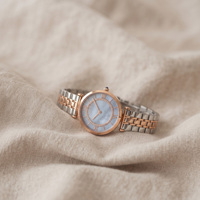 Montre pour femme en gros, or rose, acier inoxydable, diamants, chiffres romains, fabricant de montres personnalisées, montre-bracelet OEM