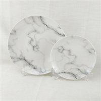 Ensembles de vaisselle en mélamine de luxe 100% en gros d'usine ensembles d'assiettes rondes au design en marbre blanc pour restaurant hôtel de fête de mariage