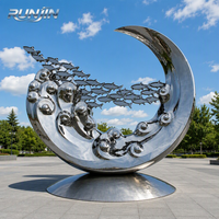 Grande sculpture d'art métallique extérieure en acier inoxydable miroir, motif vague de banc de poissons croissant, pour jardin et place publique, fabrication sur mesure