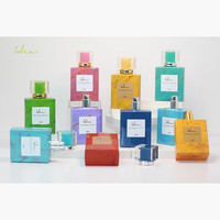 Botella de Perfume de Vidrio de 50 ml con Cabezal Pulverizador, Decoración Personalizada, Venta Caliente, Precio Bajo, Transferencia de Calor al Vacío, Efecto Marmoleado Azul Cielo