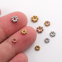 Vente en gros d'accessoires de bijoux en acier inoxydable Composants d'espacement de perles de type flocon de neige Bijoux de bricolage pour la fabrication de bracelets et de colliers