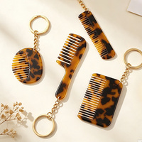 En gros Mini peigne à cheveux imprimé léopard et écaille de tortue, porte-clés et breloque de sac portable pour femmes