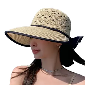 批发时尚镂空透气太阳帽蝴蝶结可折叠纸草帽太阳帽女士巴拿马帽草帽