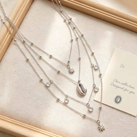 Collier vintage multicouche empilable style vacances avec pendentif goutte d'eau et étoile à huit branches, bijoux pour femme pour le quotidien