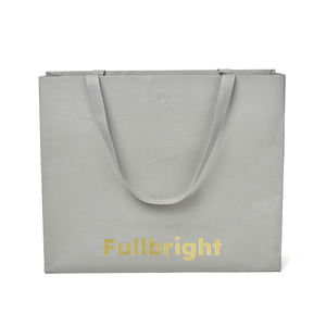 Sac en papier kraft avec logo estampé à l'or premium, imprimé sur mesure, poignée personnalisée, emballage cadeau en papier durable pour vêtements - Product Image 1