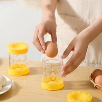 Nouveaux gadgets de cuisine séparateur de coquille d'oeuf rotatif accessoire décapant d'oeuf en plastique éplucheur fendu glisser hors de sa coquille