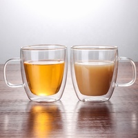 Vente en gros de tasses à café en verre à double paroi de haute qualité au design moderne tasses à thé à haute teneur en borosilicate avec poignée