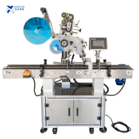 Machine d'étiquetage inviolable pour boîtes à clapet anti-effraction, emballages C-wrap, boîtes à fruits et légumes, bouteilles, bocaux et scellage des coins