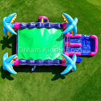 Structure gonflable commerciale avec toboggan aquatique, double glissière et piscine à jets pour événements extérieurs