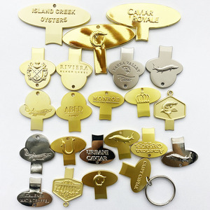 Llave <span class=keywords><strong>abridor</strong></span> de latas de caviar de metal dorado y plateado con logotipo <span class=keywords><strong>personalizado</strong></span> en relieve - Product Image 1