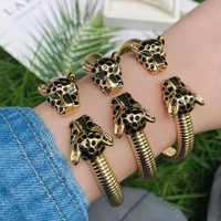 Nouveau bracelet ouvert à double tête de léopard, design hip-hop, bijoux de mode, géométrie rayée, plaqué or, zircon vert