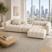 Canapé modulaire Urban Skyline moderne en bouclette crème, garni d'éponge, capitonné, profil bas, idéal pour les salons d'appartements en immeubles de grande hauteur