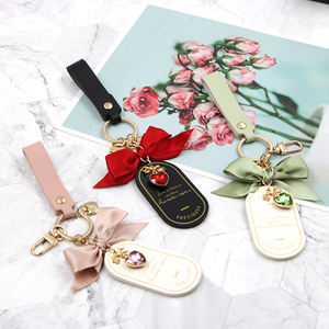 Affascinante portachiavi in pelle PU borsa portatile ciondoli accessori alla moda portachiavi decorazione regali per le donne - Product Image 6