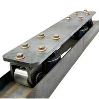 Ensemble de rouleaux de guidage pour ascenseur de marchandises
