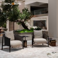Fauteuil de loisirs Designer Cleo haut de gamme en cuir pleine fleur et bouclé, avec structure en bois de frêne massif, style italien de luxe pour salon de villa