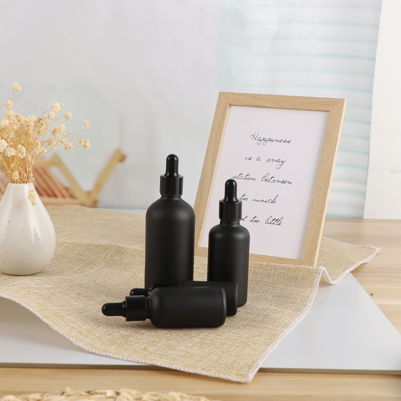 30 ml cosmetic hair essential oil bottles  frosted black glass dropper bottle