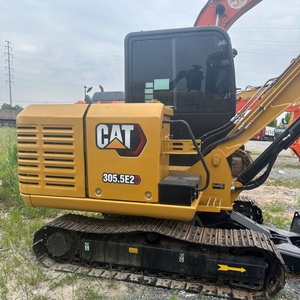 Excavatrice compacte sur chenilles CAT305.5E2, système hydraulique agile, faible consommation de carburant, idéale pour le terrassement en pente et les travaux de jardinage. - Product Image 1