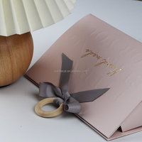 Sacs cadeaux de luxe noirs pour bijoux, faits à la main, réutilisables, emballages de shopping en gros, marque privée, papier élégant gravé