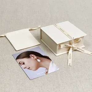 Boyang-caja de embalaje de joyería de papel con forma de libro, Eco Beige personalizado, embalaje de regalo con cinta