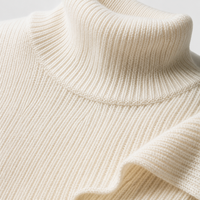 Pull-over en maille côtelée à col roulé oversize pour femme, épaules tombantes, manches longues, ourlet asymétrique, vente en gros, marque privée OEM ODM