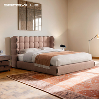 Lit rembourré de luxe de designer, lit moderne incurvé et moelleux, cadre de lit en tissu personnalisé
