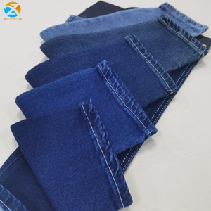 Chất lượng cao tùy chỉnh 9.25oz vải denim thô màu xanh đậm Twill căng cho nam giới/sợi nhuộm slub phong cách chàng trai cô gái cảm thấy bàn tay mềm mại - Product Image 5