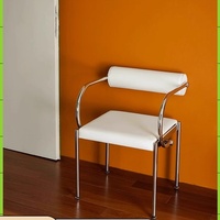 Chaise de salle à manger vintage minimaliste mobile avec revêtement en cuir et structure en acier inoxydable pour bureau et salon
