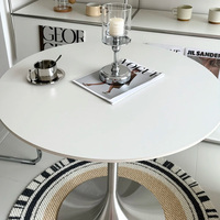 Table à manger ronde en pierre frittée nordique avec base en acier inoxydable en forme de tulipe pour petit appartement