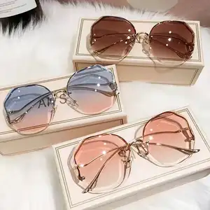 Europäisch-amerikanische neue Trend Sonnenbrille Gafas de Sol randlose Gradient Top Sale Sonnenbrille Frauen