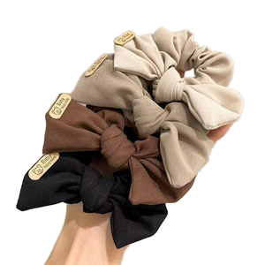 Vente en gros : Nouveaux élastiques à cheveux de créateur, style européen-américain, grands en tissu satiné, avec nœud, pour queue de cheval - Product Image 1