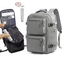 Sac à dos de compression sous vide approuvé pour le transport aérien avec pompe à air manuelle, logo personnalisé, sac à dos de voyage pour ordinateur portable avec port USB