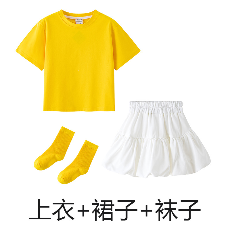 Yellow T-shirt, white skirt, yellow socks