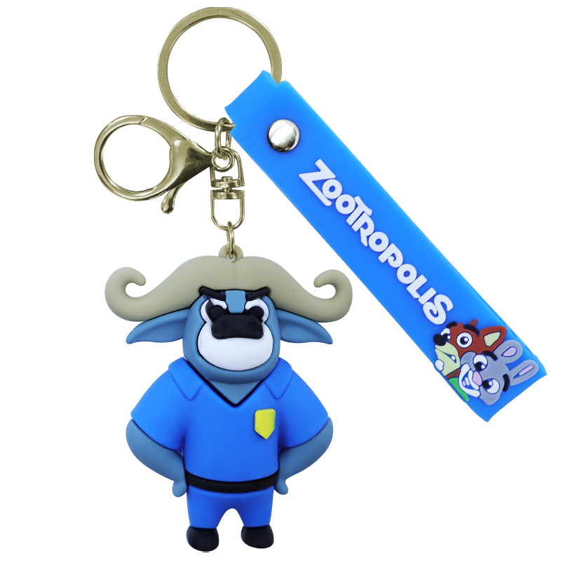 Porte-clés poupée vache policier