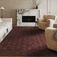 Un tapis brun vintage à motif floral oriental, un tapis traditionnel à bordures, adapté au salon