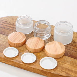 Crème cosmétique la plus vendue <span class=keywords><strong>en</strong></span> <span class=keywords><strong>pot</strong></span> <span class=keywords><strong>en</strong></span> <span class=keywords><strong>verre</strong></span> avec <span class=keywords><strong>action</strong></span> exfoliante et fini transparent 30g 50g 100g <span class=keywords><strong>Pot</strong></span> de crème avec couvercle <span class=keywords><strong>en</strong></span> bambou - Product Image 4