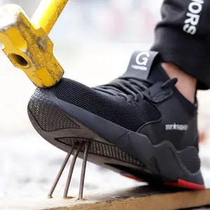 Materiale superiore nero traspirante piedini di protezione industriale scarpe antinfortunistiche isolanti con punta in acciaio