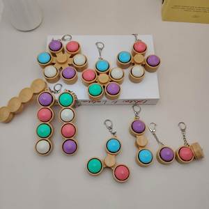 Bonito juguete antiestrés creativo de plástico con luz LED en forma de dumpling, spinner de dedo para decoración de bolsos y llaveros, al por mayor - Product Image 5