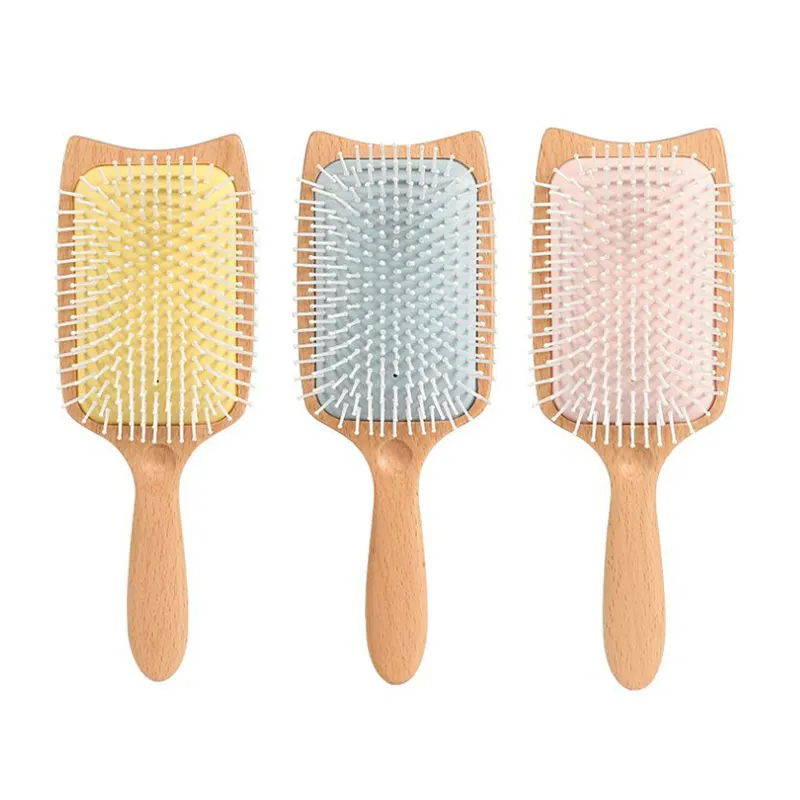 Düşük MOQ özelleştirilmiş kürek ahşap fırça sarı mavi pembe masaj ahşap tarak saç fırçası