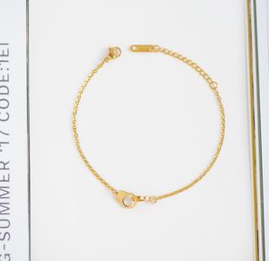 उच्च गुणवत्ता महिलाओं के गहने सोना मढ़वाया स्टेनलेस स्टील धातु मिठाइयां श्रृंखला नकली घर गिरफ्तारी कंगन - Product Image 3