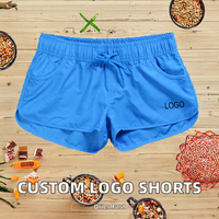 Shorts de bain décontractés d'été pour femmes, séchage rapide, taille élastique, couleur unie, logo personnalisé, pour la natation et le surf