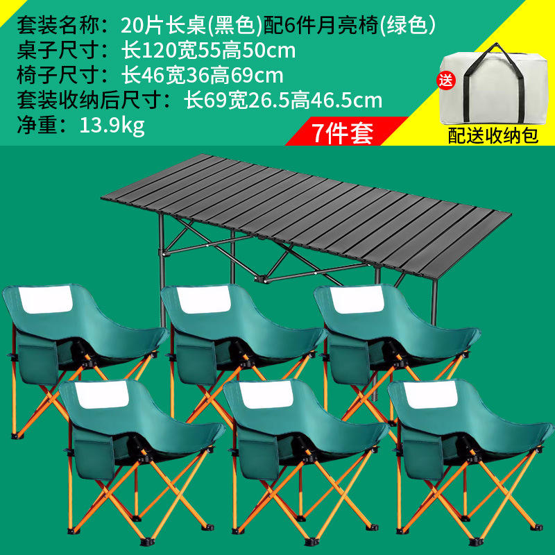 Une table noire de 120 mm de long avec 6 chaises basses lune vertes.