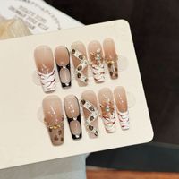 Faux ongles sculptés élégants Leopard Demon pour l'automne et l'hiver