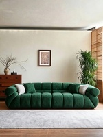 Canapé une place en tissu chenille, design épuré, couleur crème, style Wabi-sabi moderne, idéal pour salon haut de gamme ou petit appartement
