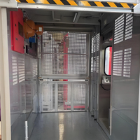 Ascenseur à double cage de 2 tonnes pour la manutention du ciment et du béton.