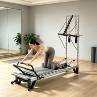Reformer Pilates avec tour en acier inoxydable, cadre en aluminium réglable et durable pour l'entraînement en studio