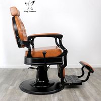 Fauteuil de barbier vintage Kingshadow en cuir marron avec structure noire, fauteuil de coiffure pour hommes