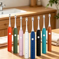Neues Produkt Mundpflege Selbstreinigende Zahnbürste Zahnaufhellungs-Set 4 Zahnbürstenköpfe Bunte Elektrische Zahnbürste