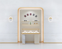 Luxuriöses Schmuckgeschäft-Innendesign: Umweltfreundliche, wasserdichte Glasvitrine mit LED-Beleuchtung und schwebendem Regal für