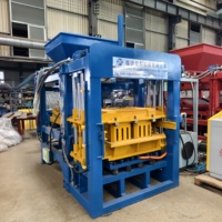 Machine de moulage de blocs entièrement automatique durable QT4-15, machine hydraulique de fabrication de briques en béton pour briqueterie moyenne