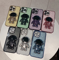 Coque de téléphone portable en TPU avec paillettes et motif astronaute entièrement électroplaqué, avec anneau en plastique de protection d'appareil photo intégré